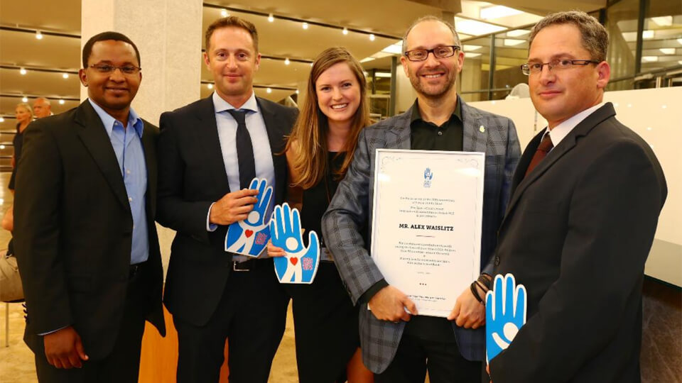 Alex Waislitz with colleagues at the Humanitarian Award ceremony